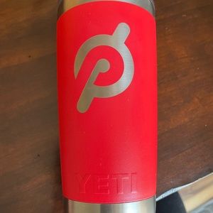 Red 20oz yeti tumbler w/ Peloton engraved